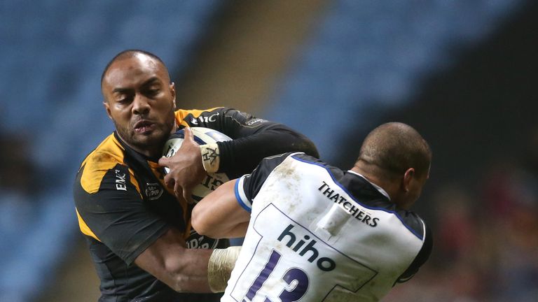 Sailosi Tagicakibau of Wasps is tackled by Bath's Jonathan Joseph