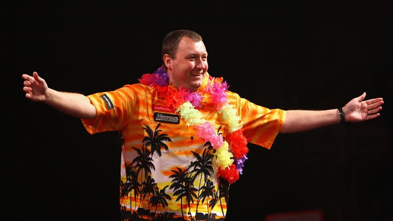 LONDON - DECEMBER 30:  Wayne Mardle of England walks on stage before his third round match against Co Stompe of The Netherlands during the 2009 Ladbrokes.c