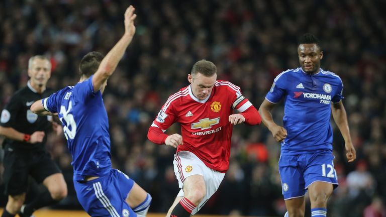 Wayne Rooney moves away from John Terry