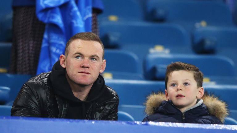 Wayne Rooney of Manchester United and son Kai attend the Barclays Premier League match between Everton and Crystal Palace at Goodison Park