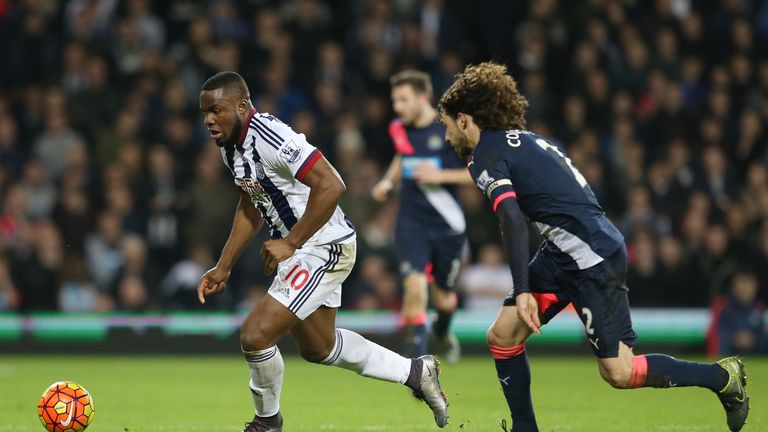 WEST BROMWICH, ENGLAND - DECEMBER 28:  Victor Anichebe of West Bromwich Albion and Fabricio Coloccini of Newcastle United compete for the ball during the B