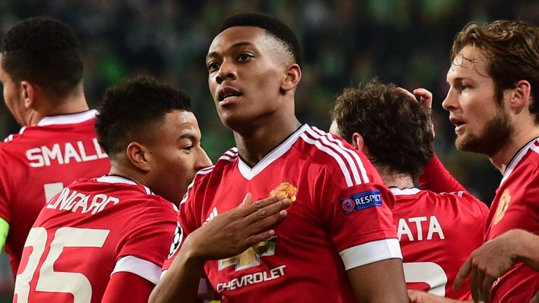 Manchester United's French striker Anthony Martial celebrates after scoring against Wolfsburg