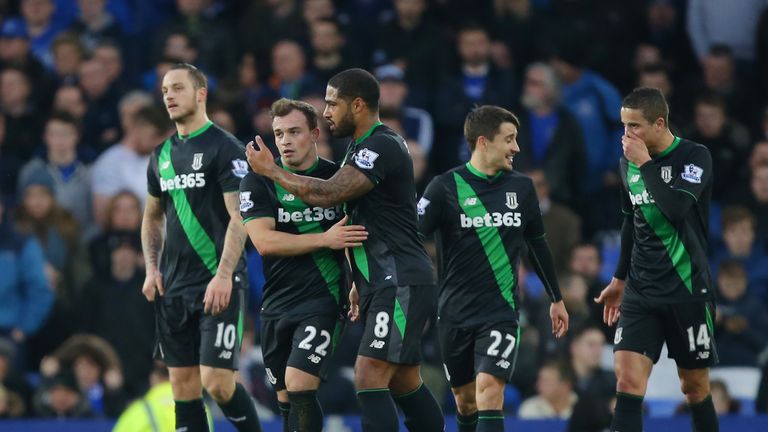 Stoke City's Xherdan Shaqiri celebrates scoring his team's second goal with his team mates during the Barclays Premier League match against Everton