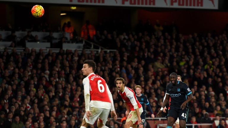 Yaya Toure of Manchester City (r) scores