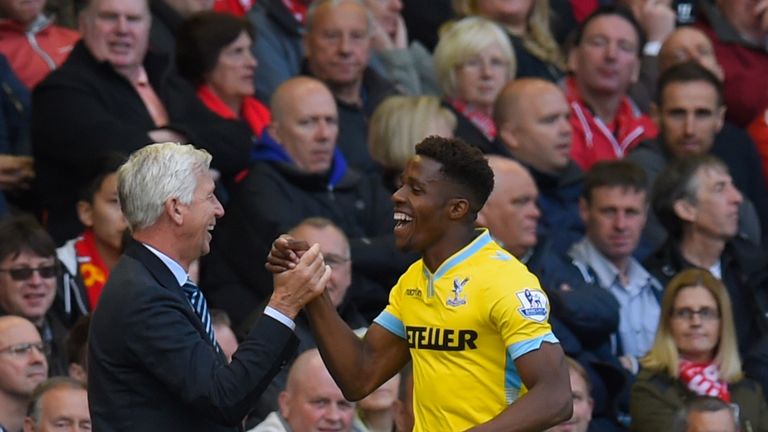 Manager Alan Pardew of Crystal Palace congratulates Wilfried Zaha