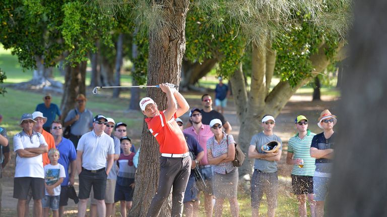 Zander Lombard in trouble at the 18th but he shares lead after three rounds in Queensland