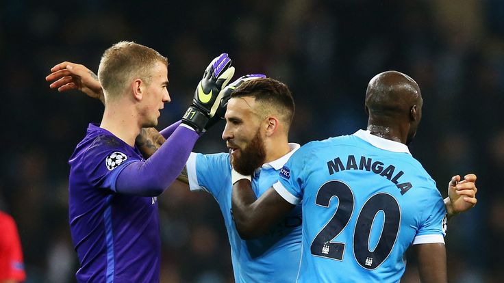 Joe Hart of Manchester City celebrates with Nicolas Otamendi and Eliaquim Mangala after the Champions League match with Sevilla at Etihad Stadium in 2015