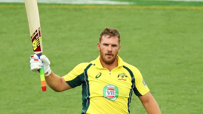 Aaron Finch of Australia celebrates scoring a century 