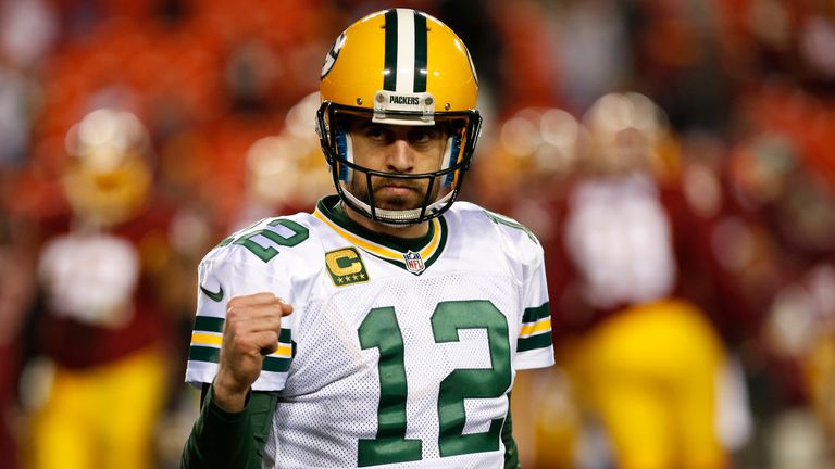 Quarterback Aaron Rodgers #12 of the Green Bay Packers celebrates after the Green Bay Packers defeated the Washington Redskins 3