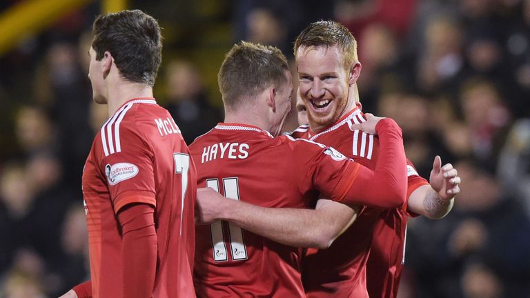 Aberdeen's Adam Rooney (right) celebrates his goal with his team-mates