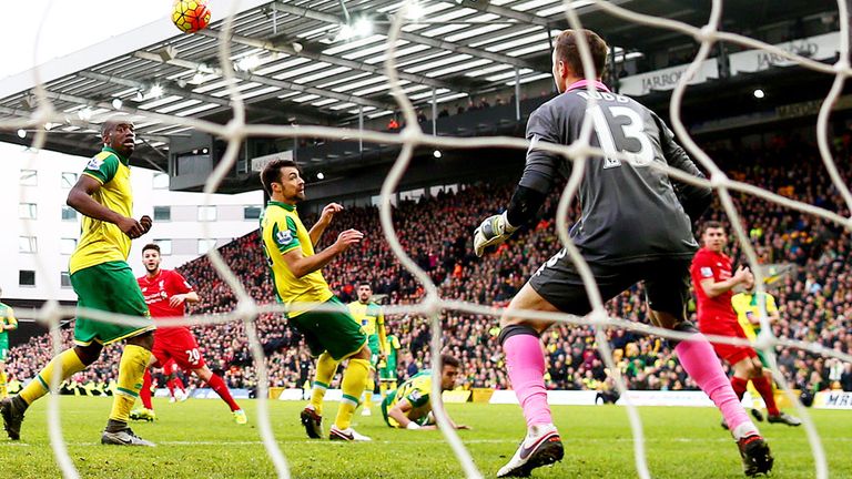 Adam Lallana (20) scores the winning goal for Liverpool at Norwich