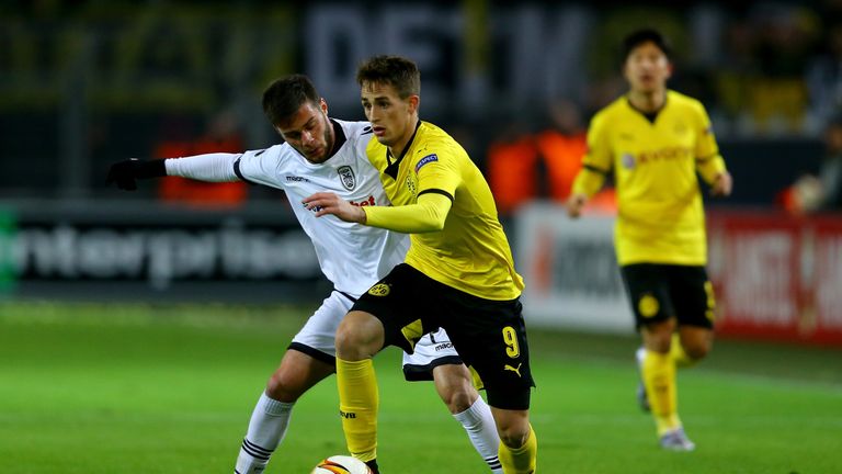 (L-R) Dimitris Konstantinidis of PAOK FC challenges Adnan Januzaj of Dortmund