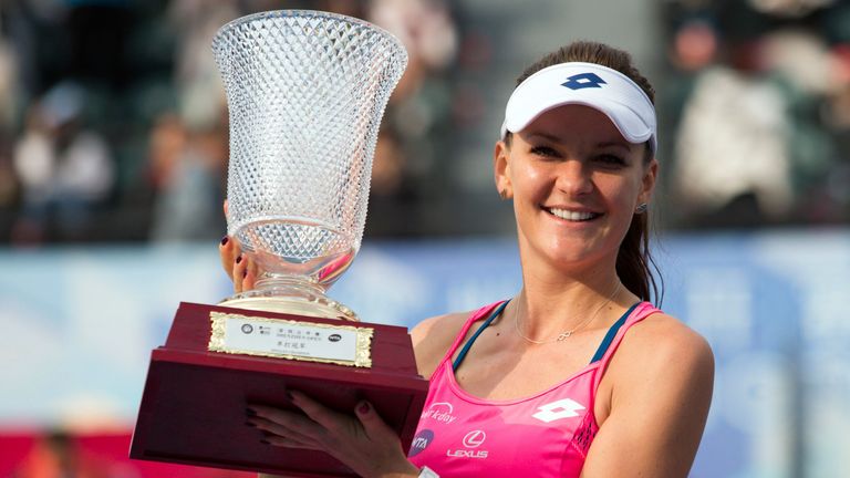 Agnieszka Radwanska lifts the Shenzhen Open trophy