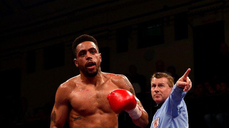 Ahmet Patterson is sent to the corner by referee Marcus McDonnell after knocking down Ryan Aston