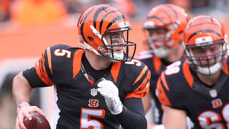 CINCINNATI, OH - JANUARY 3:  AJ McCarron #5 of the Cincinnati Bengals scrambles with the ball during the second quarter of the game against the Baltimore R