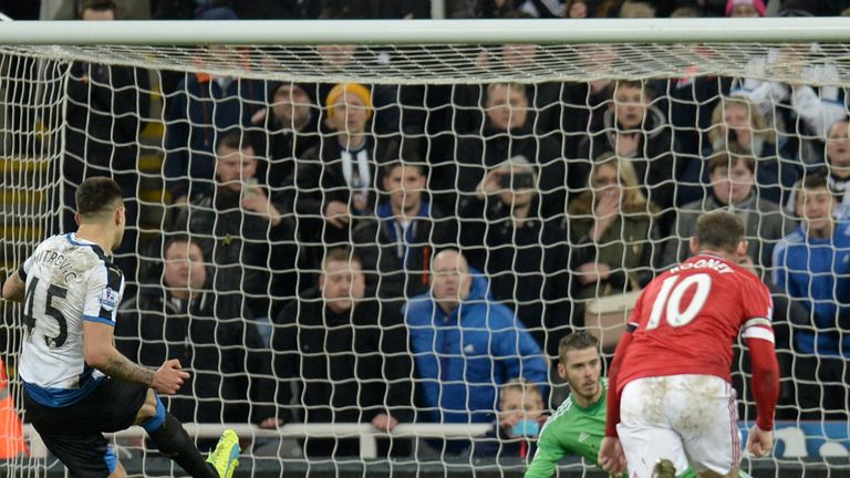 Newcastle's Aleksandar Mitrovic scores a penalty against Man United