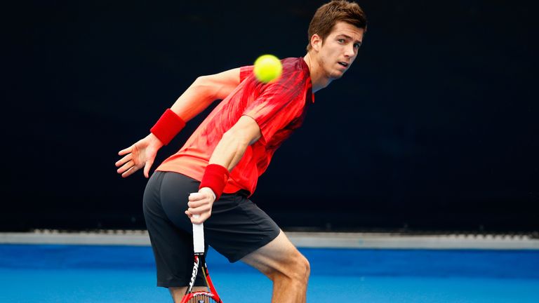 AUCKLAND, NEW ZEALAND - JANUARY 12:  Aljaz Bedene of Great Britain plays a backhand against Sam Querrey of the USA in their singles match on Day 8 of the A