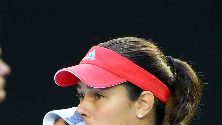 Ana Ivanovic looks on concerned as Sears is given treatment 