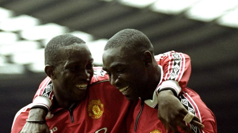 30 Aug 1999:  Andy Cole of Manchester United celebrates a goal with team mate Dwight Yorke during the FA Carling Premiership match against Newcastle United