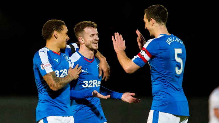 Andy Halliday (centre) celebrates after adding Rangers' fifth goal of the game against Dumbarton