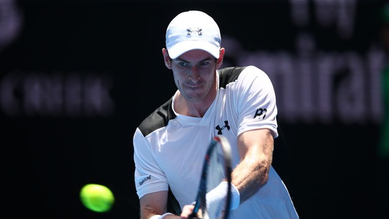 Andy Murray of Great Britain plays a backhand his first round match against Alexander Zverev of Germany during day two of the Australian Open