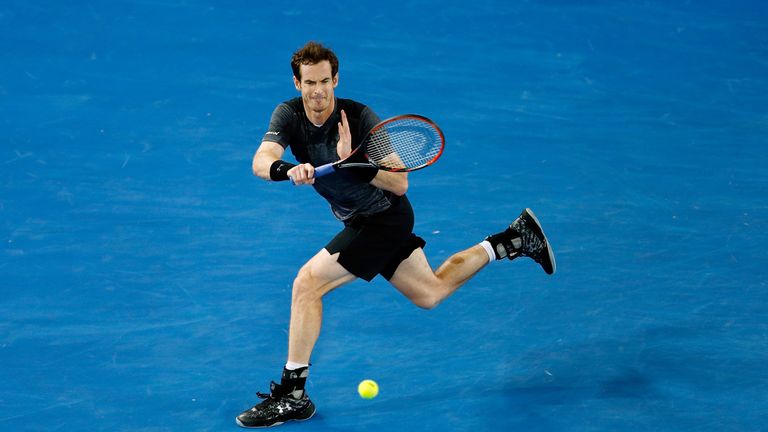 Andy Murray of Great Britain plays a forehand during his third round match against Joao Sousa of Portugal during day si
