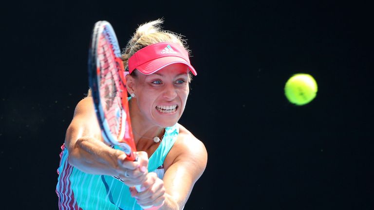 Angelique Kerber of Germany plays a backhand in her semi final match against Johanna Konta 