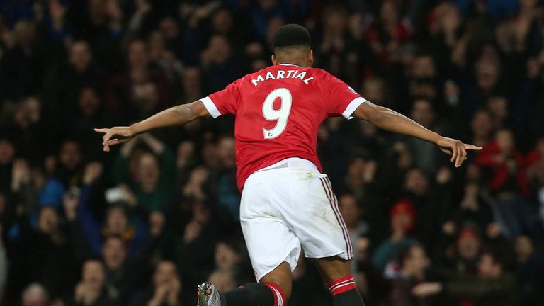 Anthony Martial celebrates scoring Manchester United's first goal during the Barclays Premier League match against Swansea City