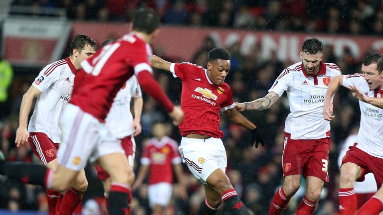 Anthony Martial tries to force his way through in the first-half against Sheffield United