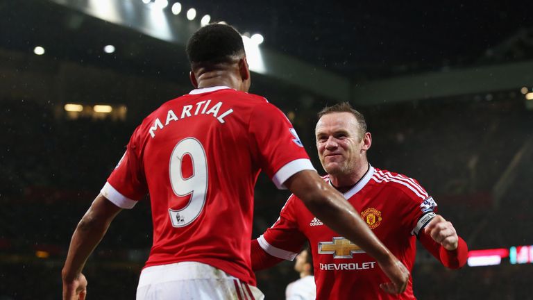 MANCHESTER, ENGLAND - JANUARY 02:  Wayne Rooney (R) of Manchester United celebrates scoring his team's second goal with his team mate Anthony Martial (L) d