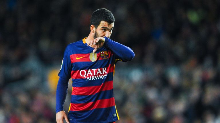 Arda Turan of FC Barcelona looks on