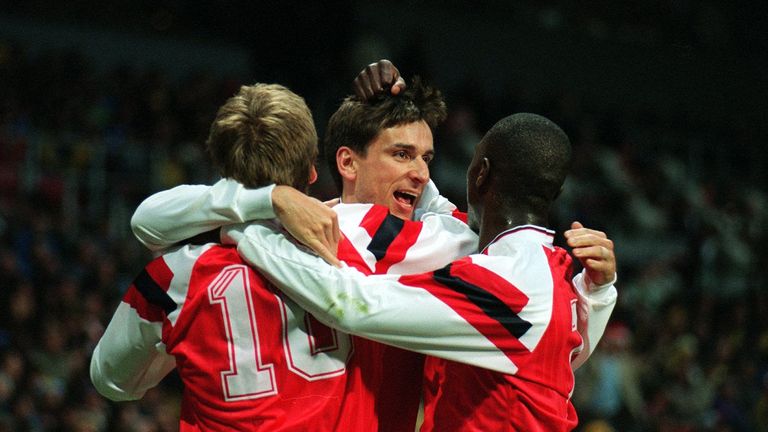 Alan Smith is congratulated by his team-mates following his goal against Parma