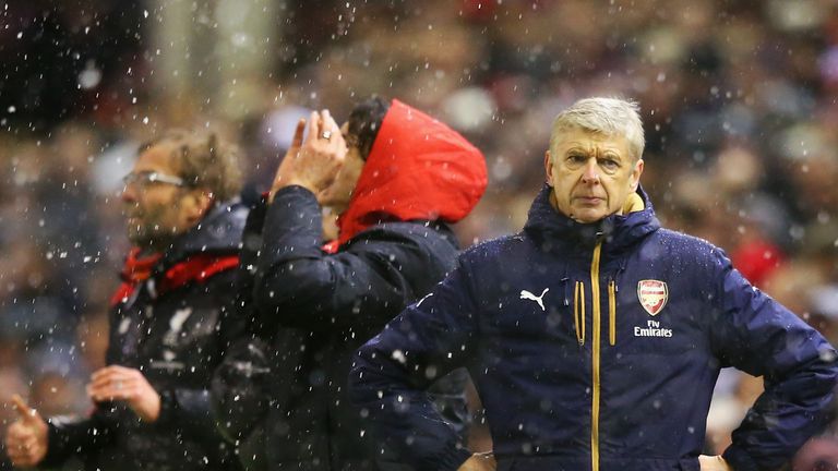 Arsene Wenger reacts after Liverpool's third goal