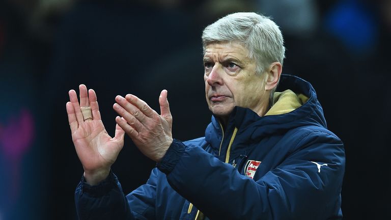 Manager Arsene Wenger applauds the Arsenal fans at full-time