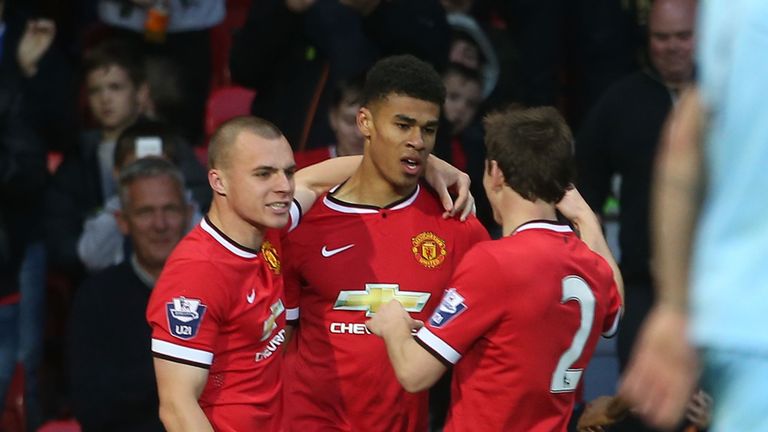 Ashley Fletcher (centre) celebrates scoring for Manchester United's U21 side