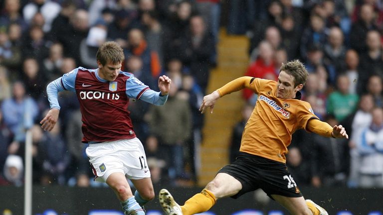 Aston Villa winger Marc Albrighton vies with Wolves striker Kevin Doyle during the Premier League game in March 2010