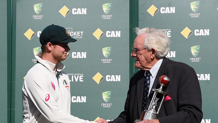 Australia captain Steve Smith is presented with the Frank Worrell trophy 