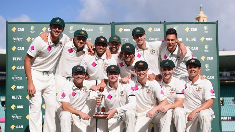 The Australian team pose with the Frank Worrell Trophy