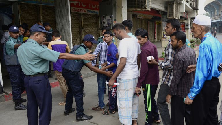 Police search football fans ahead of the Bangladesh v Australia match in November last year in Dhaka