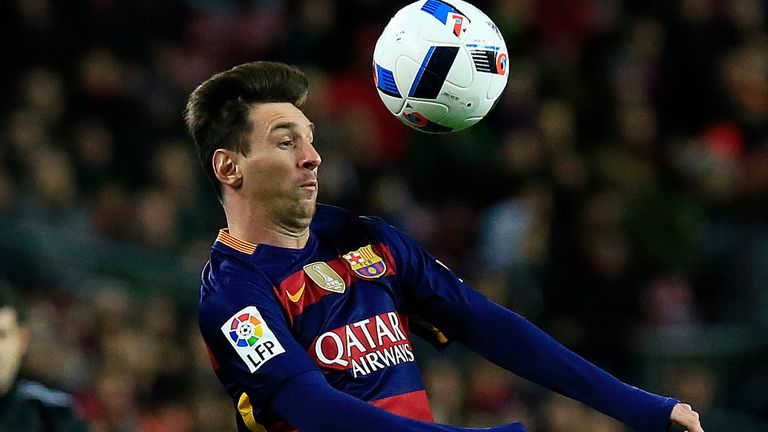Barcelona's Lionel Messi controls the ball on his chest