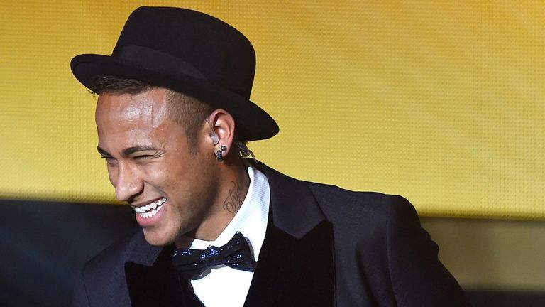 Barcelona and Brazil forward  Neymar laughs on stage during the 2015 FIFA Ballon d'Or award ceremony
