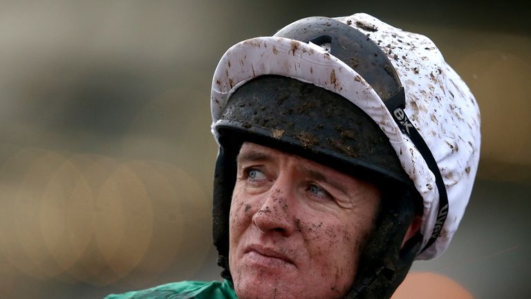 Jockey Barry Geraghty after riding Leave At Dawn to victory in the Martin & Co Jewellers Intermediate Handicap Hurdle at Cheltenham.