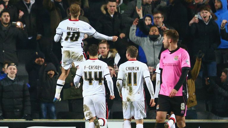 Ben Reeves of MK Dons celebrates scoring from the penalty spot 