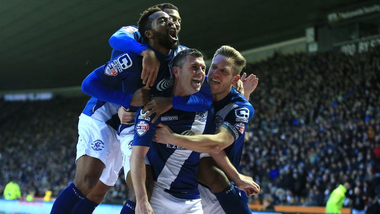 Birmingham City's Paul Robinson (bottom) celebrates scoring his side's first goal of the game against Derby County.