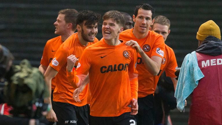 Dundee United's Blair Spittal celebrates after scoring against Dundee