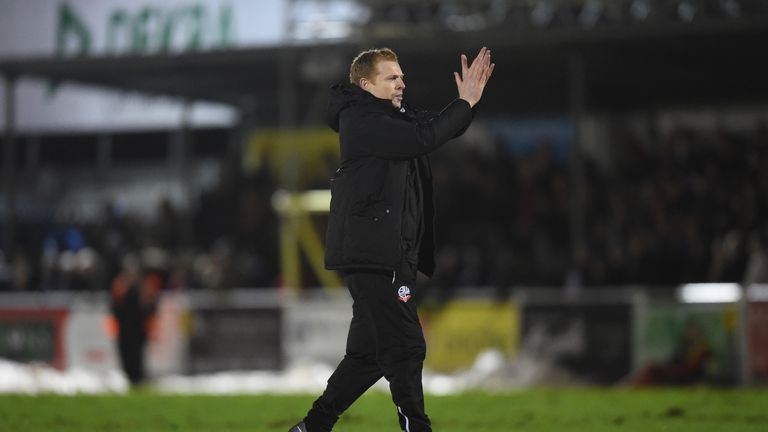 Bolton Wanderers manager Neil Lennon applauds the travelling fans following the Emirates FA Cup, third round game at the Silverlake Stadium, Eastleigh.