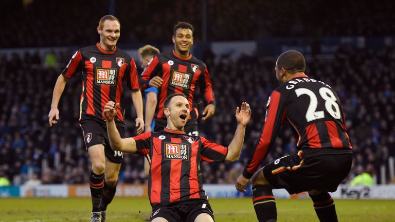 Marc Pugh (middle) of Bournemouth celebrates scoring his team's winning goal against Portsmouth