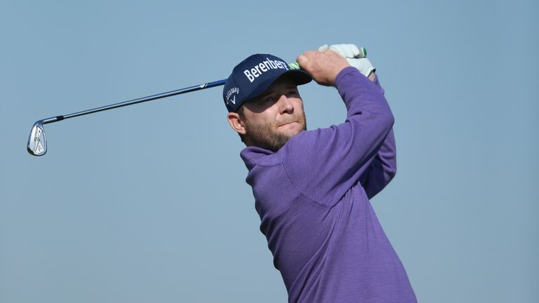 Branden Grace became the first man to successfully defend the Qatar Masters title