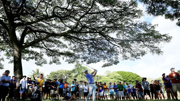 Brandt Snedeker plays a shot from the rough on the eighth hole during the third round of the Sony Open