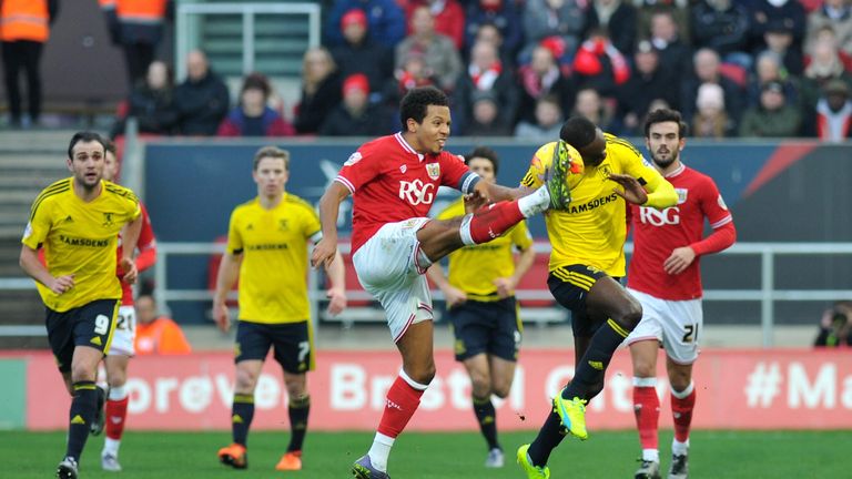 Bristol City's Korey Smith (left) and Middlesbrough's Albert Adomah in action during the Sky Bet Championship match at Ashton Gate